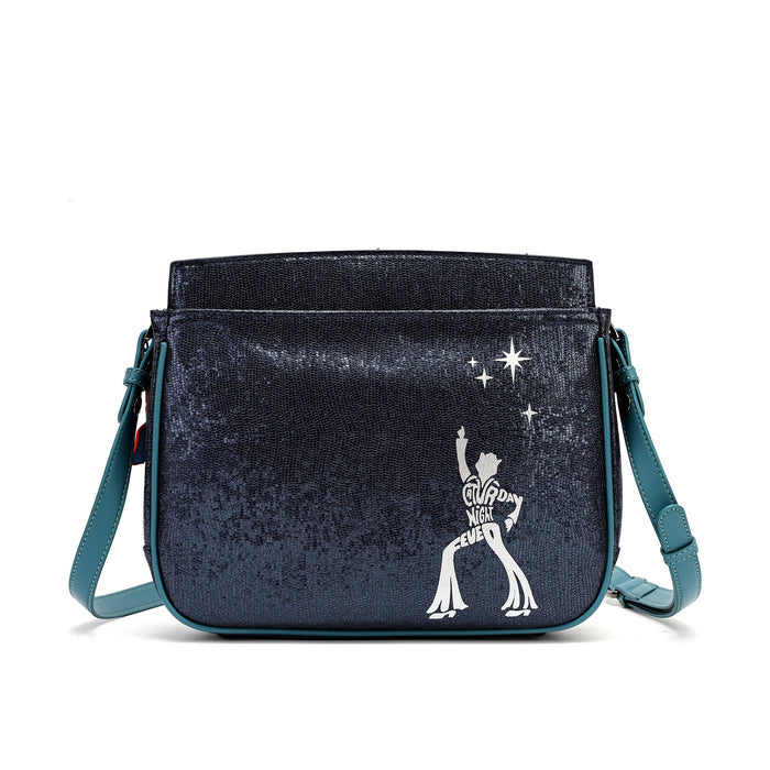 A dark navy blue glittery shoulder bag with a teal strap and a white graphic of a dancer with stars, set against a plain white background.