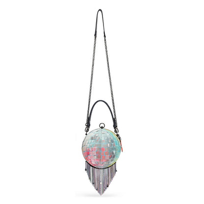A round disco ball purse with a colorful mirrored surface, dangling fringe, and a black chain shoulder strap, shown on a plain white background.