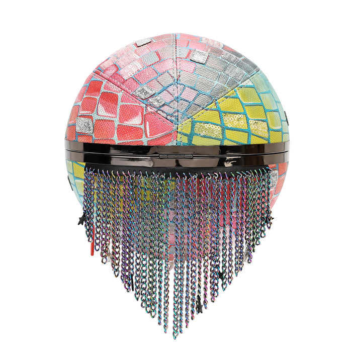 A spherical decorative object with a mosaic tile pattern in pink, blue, yellow, and silver, featuring a glossy black horizontal band and hanging iridescent chains below, shown on a plain white background.
