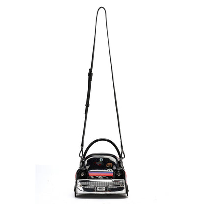 A black faux leather shoulder bag designed in the shape of a classic car, featuring a long black shoulder strap and a chrome silver front grille.