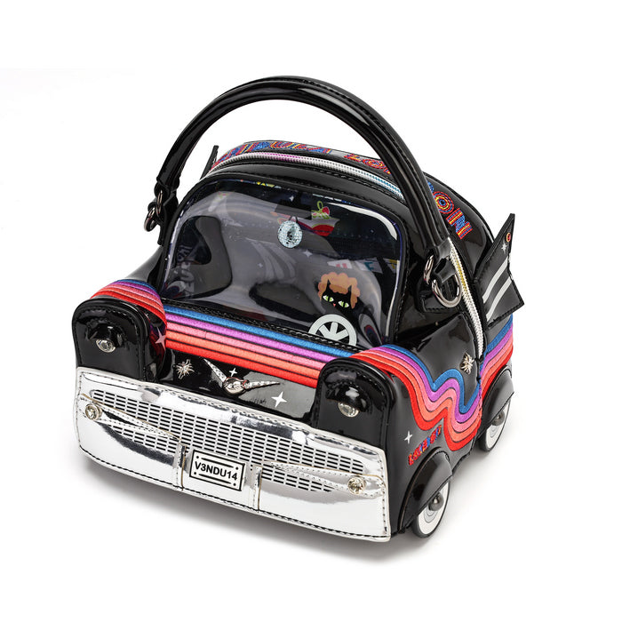 A novelty handbag shaped like a retro car, featuring a glossy black body, a chrome silver front grille, and wavy multicolor stripes in pink, blue, and orange along the side. The bag has a clear windshield, a black handle, and small decorative details including a cartoon character in the driver's seat.