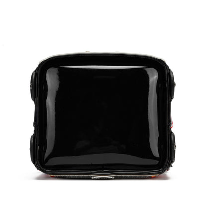 A glossy black patent leather suitcase shown from the front against a plain white background.