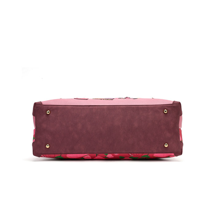 A roomy holdall for travel, busy days or carrying extra essentials, with twin handles and an adjustable detachable strap. The sewing-themed artwork combines cotton reels, ribbons, scissors and rose motifs with Pink Ribbon details, finished with hand-stitched accents.
