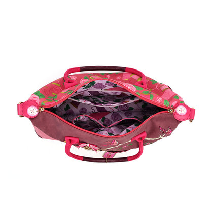 A roomy holdall for travel, busy days or carrying extra essentials, with twin handles and an adjustable detachable strap. The sewing-themed artwork combines cotton reels, ribbons, scissors and rose motifs with Pink Ribbon details, finished with hand-stitched accents.
