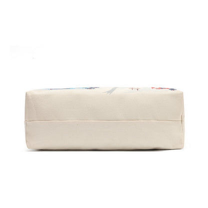 A rectangular beige canvas storage box or organizer with a subtle multicolor floral pattern visible along the top edge, shown against a plain white background.