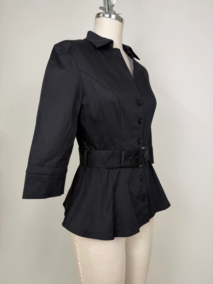 A black women's peplum-style jacket with three-quarter sleeves, a pointed collar, and a matching self-tie belt, displayed on a cream dress form against a light gray background.