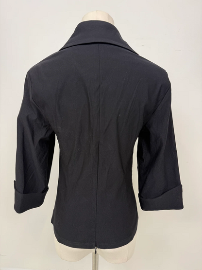 A dark charcoal gray women's blazer shown from the back on a mannequin torso, featuring a pointed collar, three-quarter sleeves with rolled cuffs, and a center back seam.