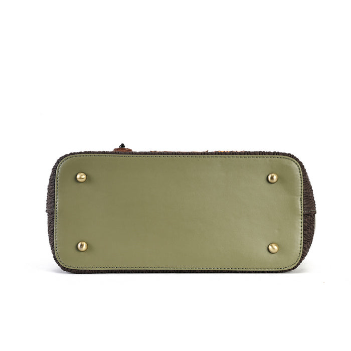 The bottom view of an olive green leather pouch with gold-tone metal studs and a dark brown textured trim, shown on a plain white background.