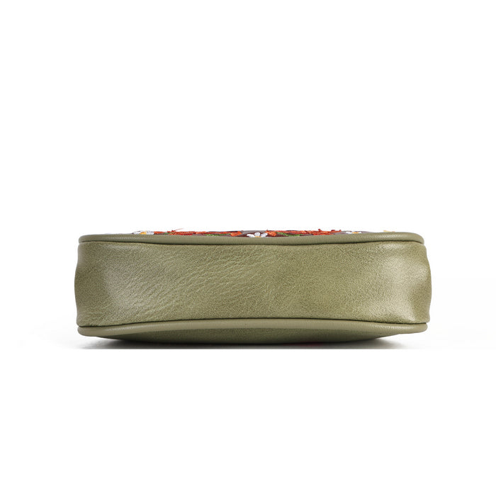 A top-down view of a sage green leather pouch or clutch with a colorful embroidered pattern along the top edge, set against a plain white background.
