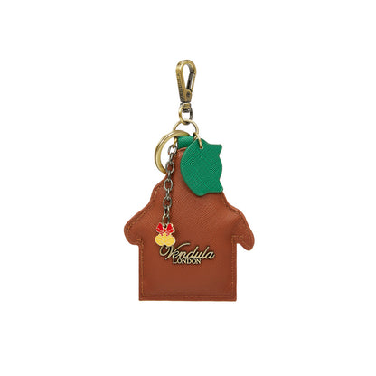 Brown leather keychain with green leaf and red flower design on a white background