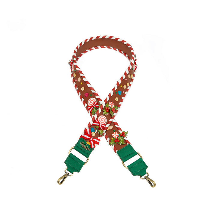 Christmas-themed bag strap with candy cane pattern on a white background