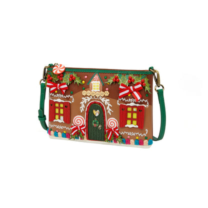 Gingerbread house-themed crossbody bag on a white background