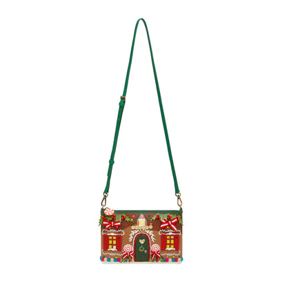 Decorative handbag with gingerbread house design on a white background