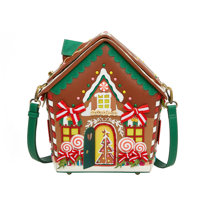 Gingerbread house-shaped handbag with decorative elements on a white background