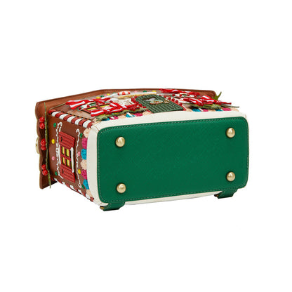 Colorful textured box with green base and decorative elements on a white background