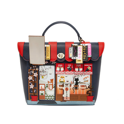 Multicolored handbag with graphic designs on a white background