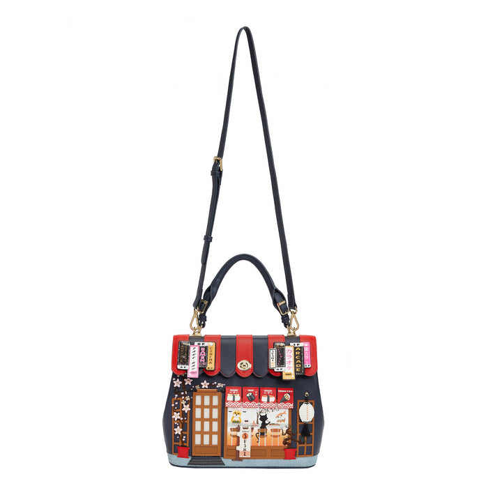 Handbag with a detailed design on a white background