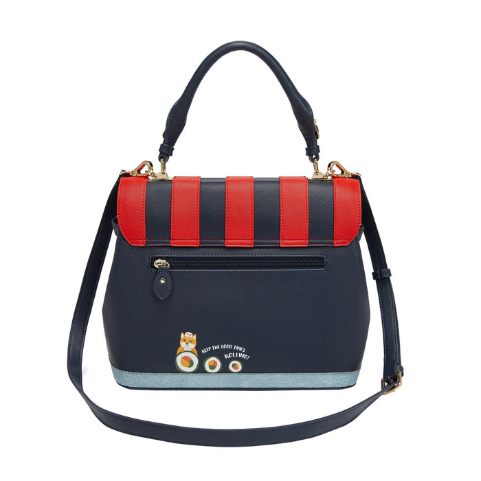 Navy blue handbag with red accents and a cat illustration on a white background
