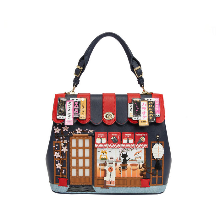 Handbag with a design of a street scene and buildings on a white background