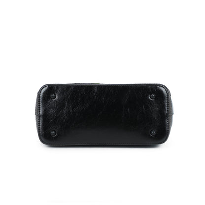 Black leather clutch bag on a white background