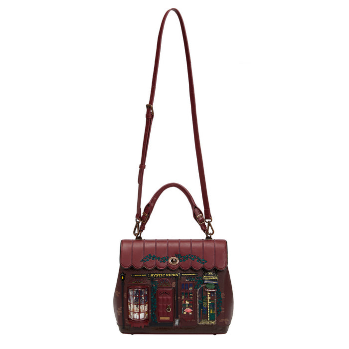 Handbag with a detailed design on a white background