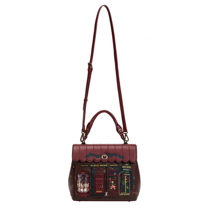 Handbag with a detailed design on a white background