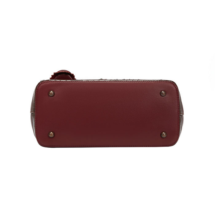 Maroon handbag with gold studs on a white background