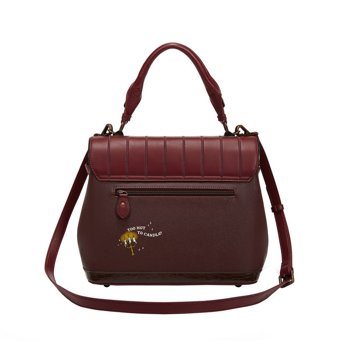 Maroon handbag with a visible brand logo on a white background
