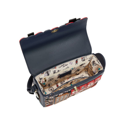 Navy blue handbag with a patterned interior on a white background