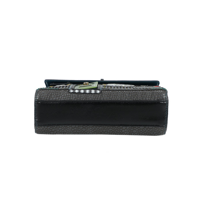Black clutch bag with a textured pattern on a white background