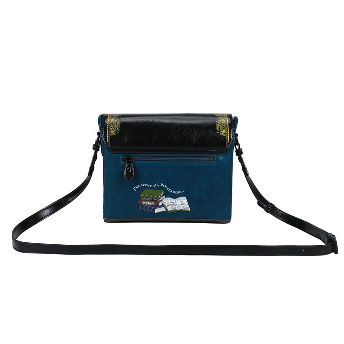 Blue crossbody bag with black strap on a white background