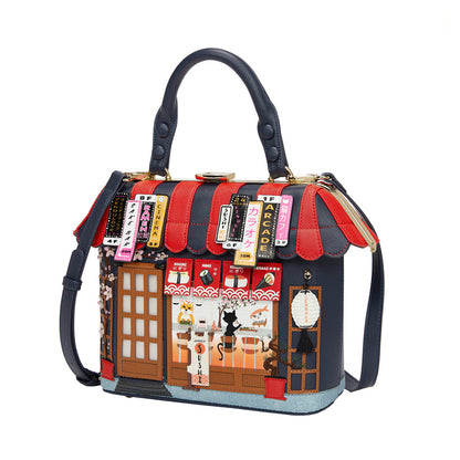 Handbag with a design of a store front and signs on a white background