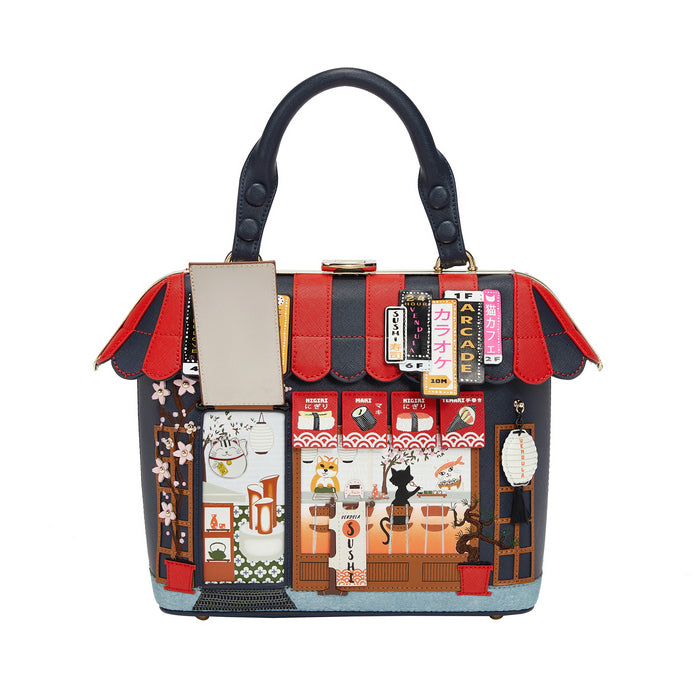 Handbag with a detailed design of a cat cafe on a white background