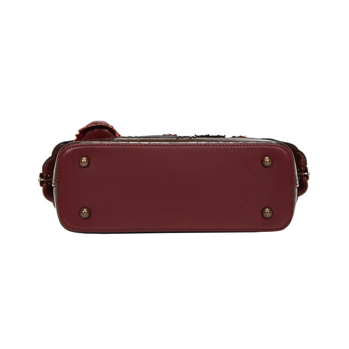 Red handbag with gold accents on a white background