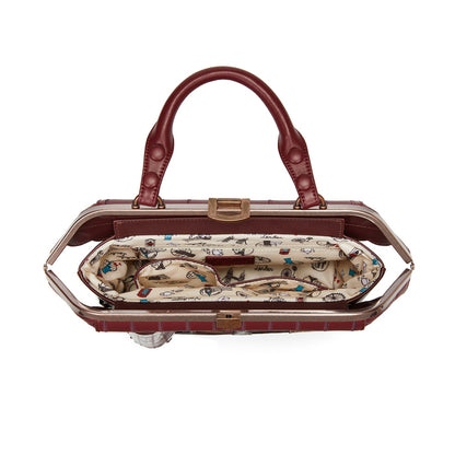 Brown handbag with a patterned interior on a white background