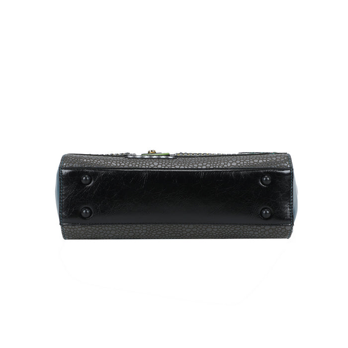 Black textured handbag on a white background