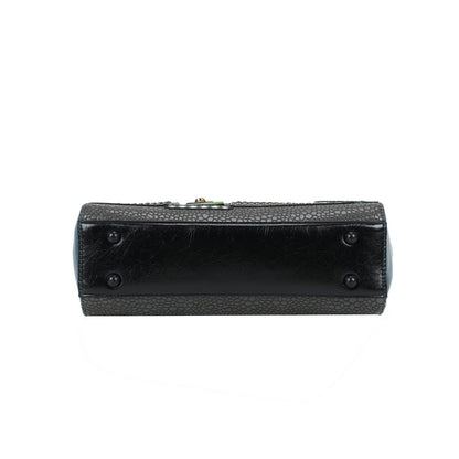 Black textured handbag on a white background