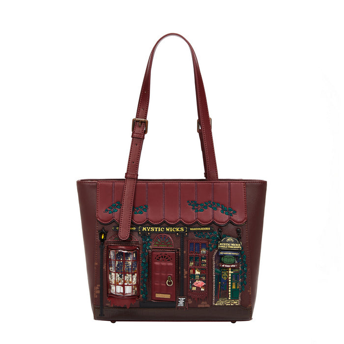 Brown tote bag with decorative design on a white background