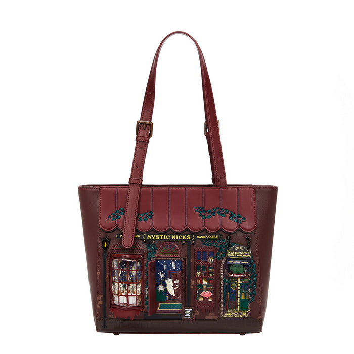 Brown tote bag with detailed design on a white background