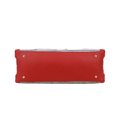 Red clutch bag with gold studs on a white background