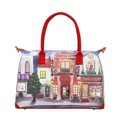 Handbag with a colorful street scene design on a white background
