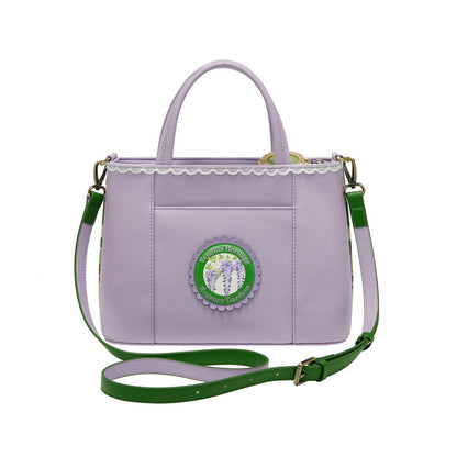 Regency Gardens Faye Bag is romance in miniature. This vegan leather bag is perfectly sized to carry your daily essentials or your favourite historical romance novel! The top handle and adjustable detachable strap allow you to carry it your way