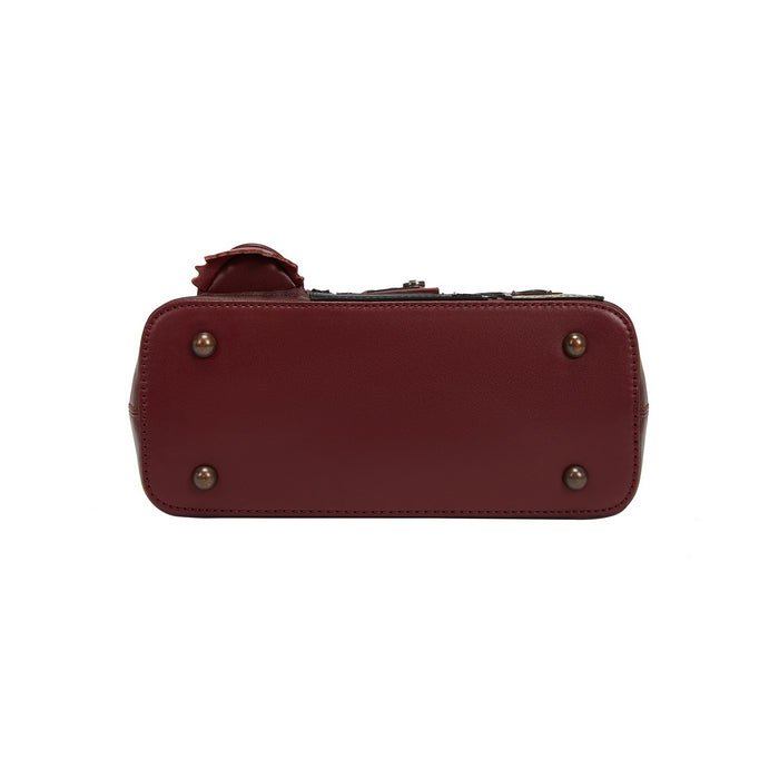 Red handbag with gold studs on a white background