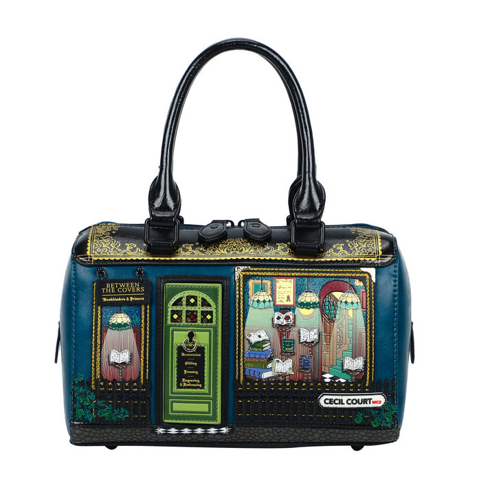 Decorative handbag with artistic designs on a white background