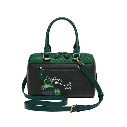 Green and black handbag with a decorative strap on a white background
