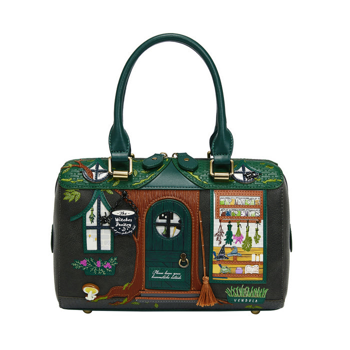 Handbag designed like a witch's house with detailed illustrations on a white background