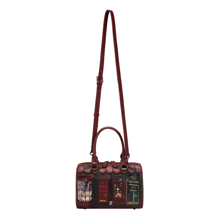 Decorative handbag with artistic design on a white background