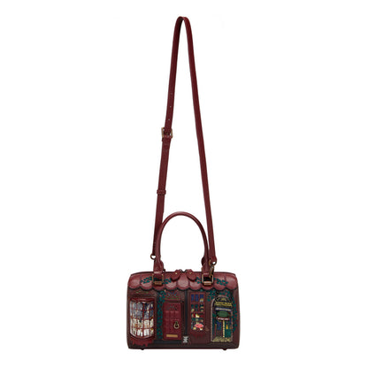 Decorative handbag with artistic design on a white background
