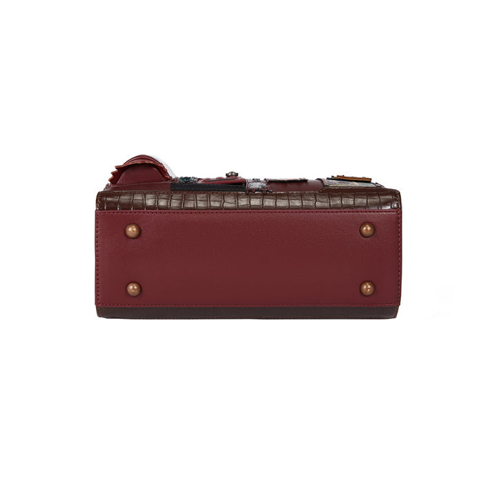 Red handbag with gold accents on a white background