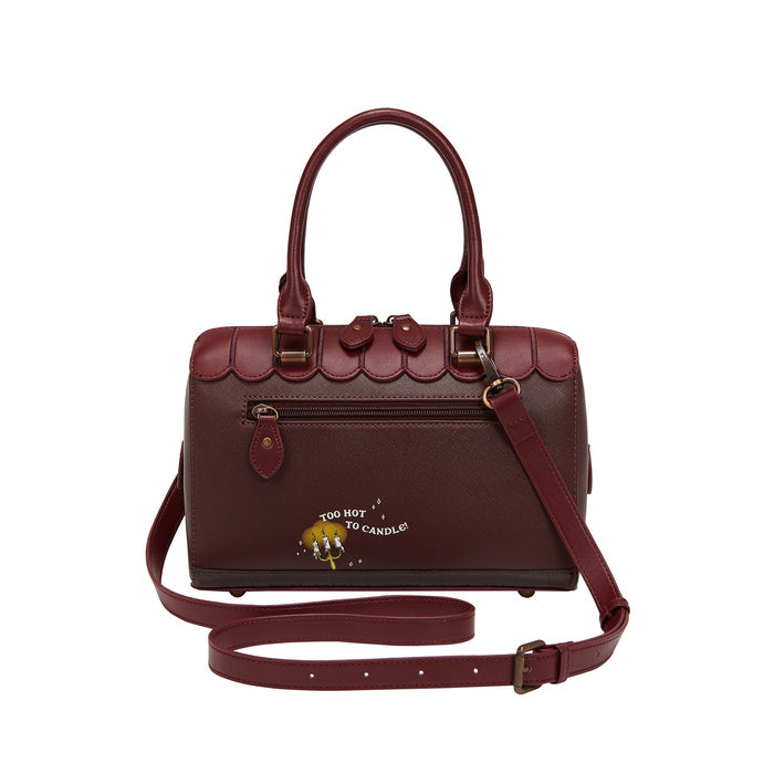 Brown handbag with scalloped edge design on a white background